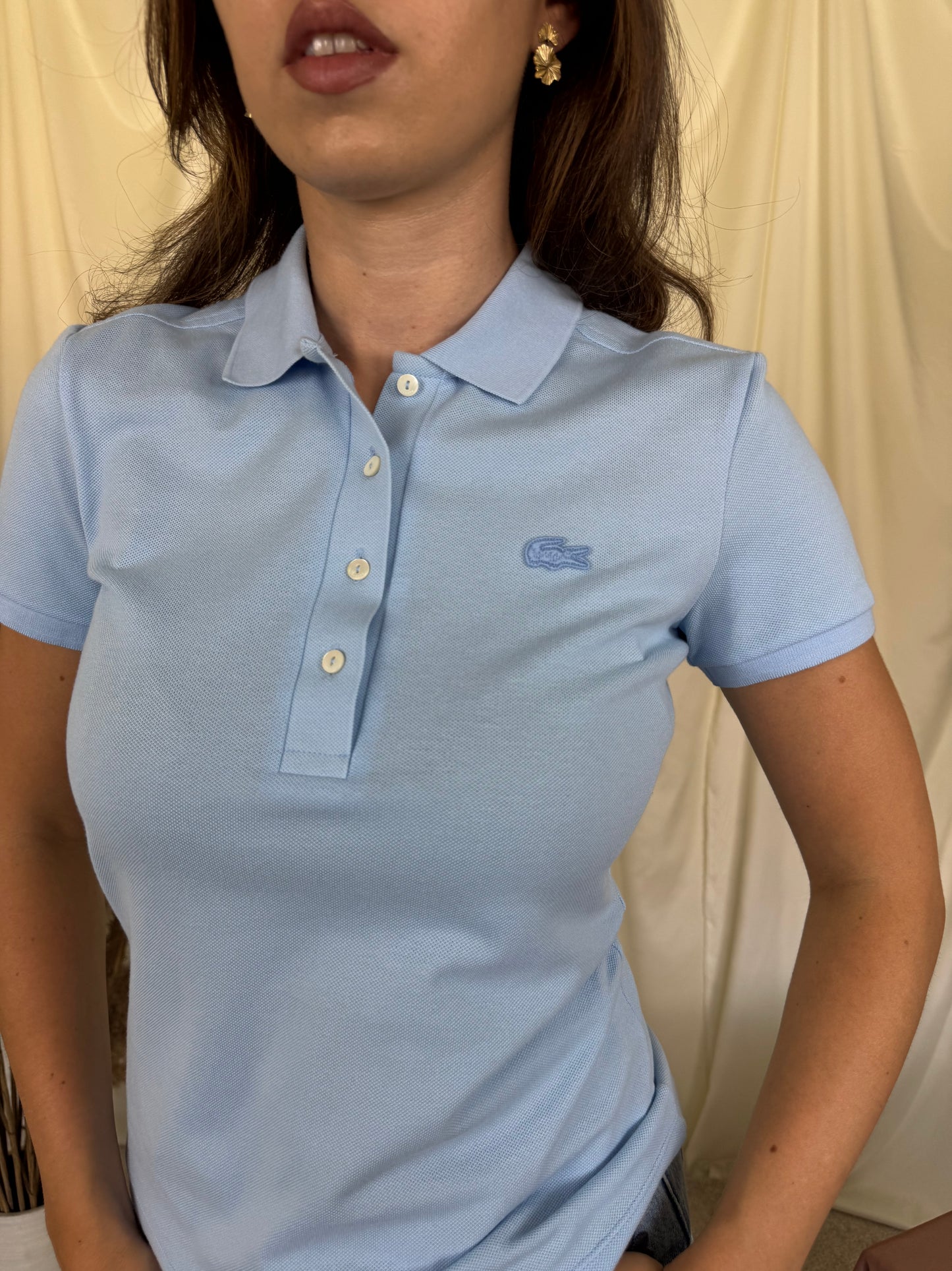 Tricou Lacoste din 100% bumbac baby blue 
(Mărimea xs/s)