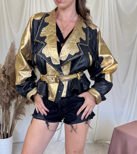 Piesă vintage statement din piele naturală extrem de rară cu aplicații spectaculoase, franjuri și ținte. TRUE VINTAGE 
(Mărimea S-L)